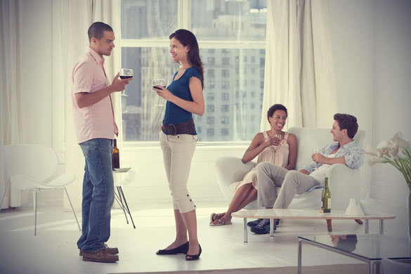 friends hanging out and drinking wine